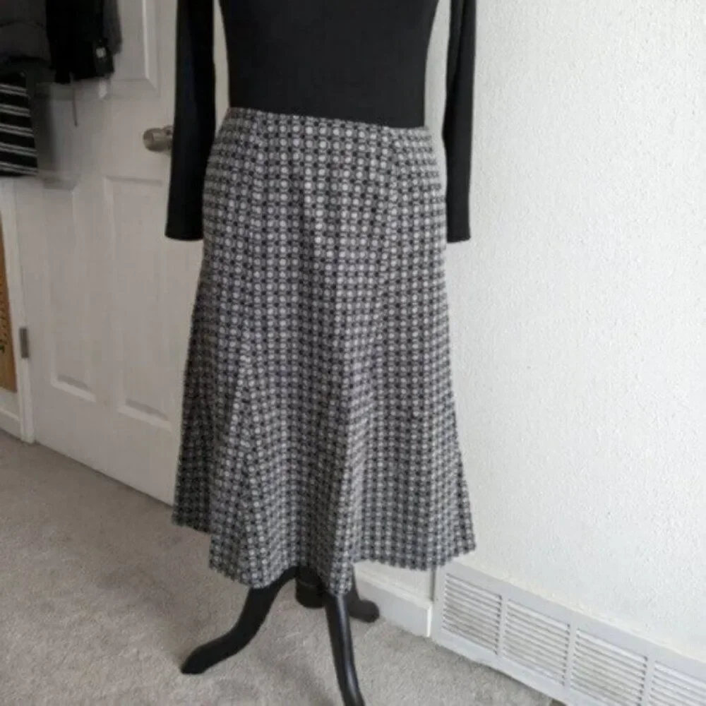 Beautiful Black and White Nine West skirt with embordered fabric